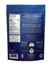 गैलरी व्यूवर में इमेज लोड करें, Medallion Milk Co. French Vanilla Coffee Creamer powder back-of-pack showing nutrition facts, ingredients, preparation instructions, bilingual English and French text, Canadian dairy product made since 1965, 450 g resealable pouch.
